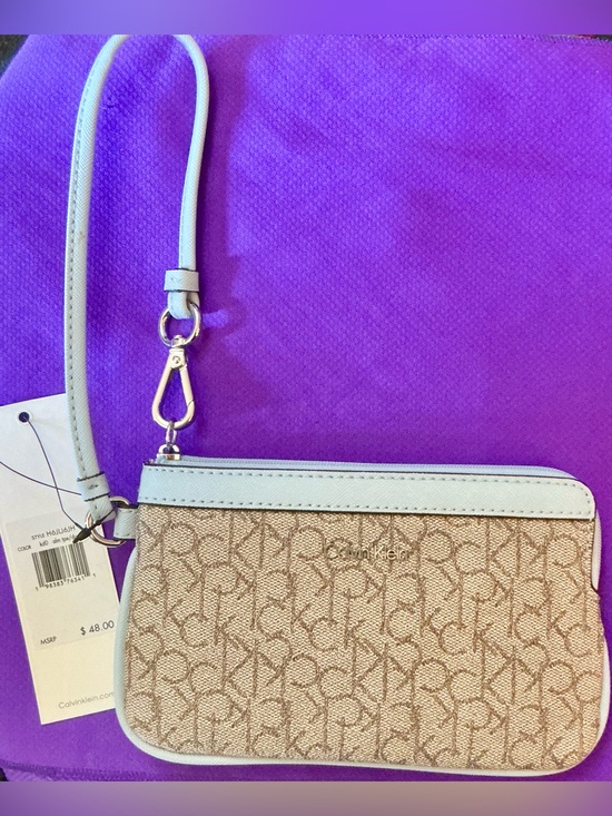 Calvin Klein Handbags - Calvin Klein Beige Logo Crossbody with Light Blue Trim and Strap